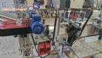 Automatic double head labeling machine for flat bottles Bauch Campos