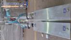 Semi-automatic pneumatic liquid filling machine with two nozzles