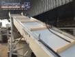 Inclined conveyor belt with talisca