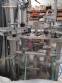 Line for filling powdered products in rigid bottles Optima