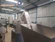 Complete filling line with Tecman Nelpas Tecnoenvase Tudela bottle filling, labeling, capping, and positioning machines for cosmetic liquids.