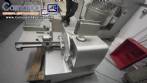 Bizerba automatic stainless steel slicer for cheeses, cold cuts, sausages, and meats.