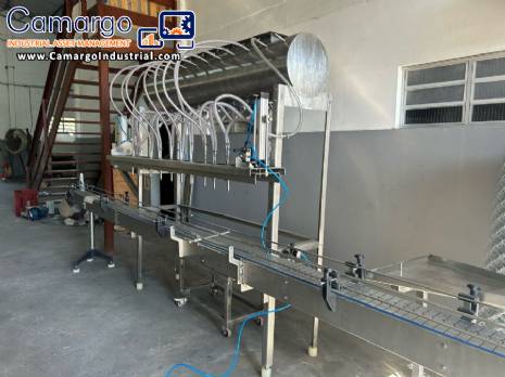 Semi-automatic linear filling machine with capping system