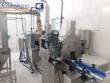 Line for brine filling manual product insertion and automatic capping