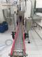 Line for brine filling manual product insertion and automatic capping