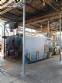 Wood-fired flame tube boiler for steam generation