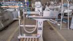 Filling machine with 2 nozzles for liquids and pilfer cap screwer