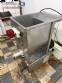Stainless steel meat grinder with size 98 opening.