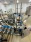 Automatic stainless steel filling machine for a�a� jars, Bramak ice cream