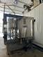 Packaging line with IMSB bung capper, Maqmundi labeler and accumulator table