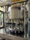 Packaging line with IMSB bung capper, Maqmundi labeler and accumulator table