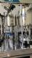 Packaging line with IMSB bung capper, Maqmundi labeler and accumulator table