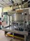 Stainless steel rotary filling machine with 16 IMSB nozzles for bottles and jars