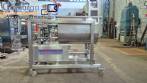 Unifiller stainless steel dosing pump with homogenizing mixer for bakery foods.