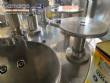 Gravimetric rotary filling machine in stainless steel with cabin