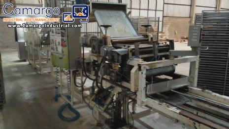 Automatic continuous line for the production and dehydration of fresh homemade pasta.
