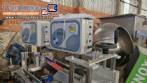 Automatic double-head labeling machine for cylindrical and flat bottles, Tudela, 3,000 labels per hour.