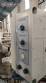 Automatic double-head labeling machine for cylindrical and flat bottles, Tudela, 3,000 labels per hour.