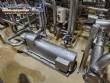 Stainless steel processing reactor tanks, 1140 liters, with pump valves.