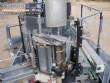 Krones automatic rotary label applicator for paper labels.