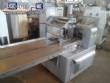 Varied flow pack wrapping machines