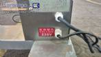 Semi-automatic stainless steel liquid filling machine with 1 nozzle.