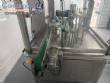 Automatic rotary filling, dosing, and sealing machine for communion cups and small cups.