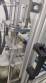 Rotary filling line for dropper bottles with Certo cylindrical self-adhesive labels