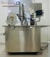 Capsule encapsulator, counter and polisher, capacity 22,000 capsules per hour.