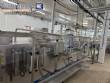 Horizontal stainless steel packaging machine for Profills stand-up pouch packaging.