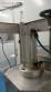 Rotmaq screw capping machine with cap positioning elevator