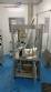 Rotmaq screw capping machine with cap positioning elevator