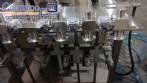 Linear filling machine with 6 pistons filling system