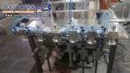 Linear filling machine with 6 pistons filling system
