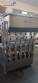 Linear filling machine with 6 pistons filling system