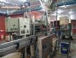 CompoMaq rotary filling machine with 42 nozzles and screw capper