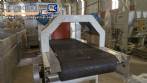 Labeling machine with steam sleeve tunnel and bottle baler
