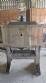 Labeling machine with steam sleeve tunnel and bottle baler