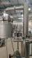 Distiller extractor concentrator with heating jacket and condensation system