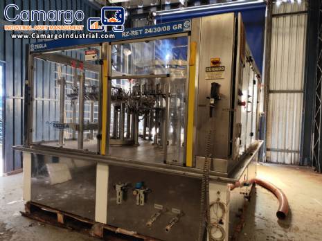 Zegla rotary filling machine with rinser and three-block capping system.