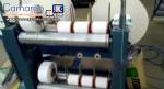 Automatic line for manufacturing diapers