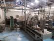 Automatic filling and sealing machine for gelatin cups, 12,000 units/hour.
