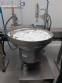 Filling line with capsule counter and screw machine