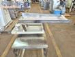 Vibrating trough for multi-head scale