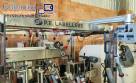 Labeling machine for flat and cylindrical P.E. LABELLERS P.E. Latina