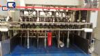 Rotary packer with 50 nozzles and 18 wrapping machines IMSB