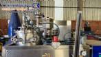 Stainless steel filling machine for beer liquids in Brabeer bottles