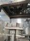 Stainless steel filling machine for beer liquids in Brabeer bottles
